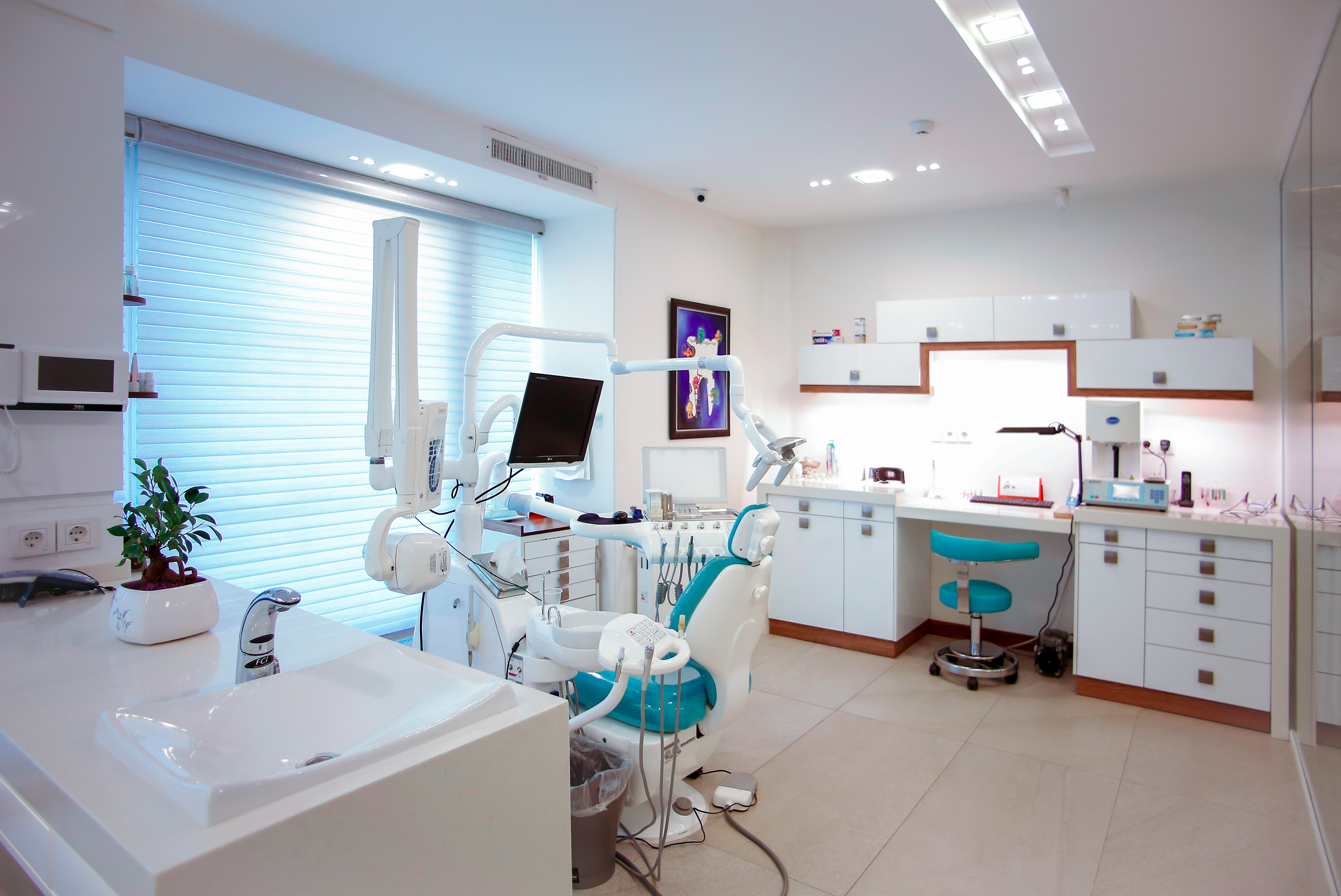 Friendly dental team welcoming a patient